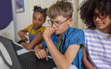 Middle school students at school computer